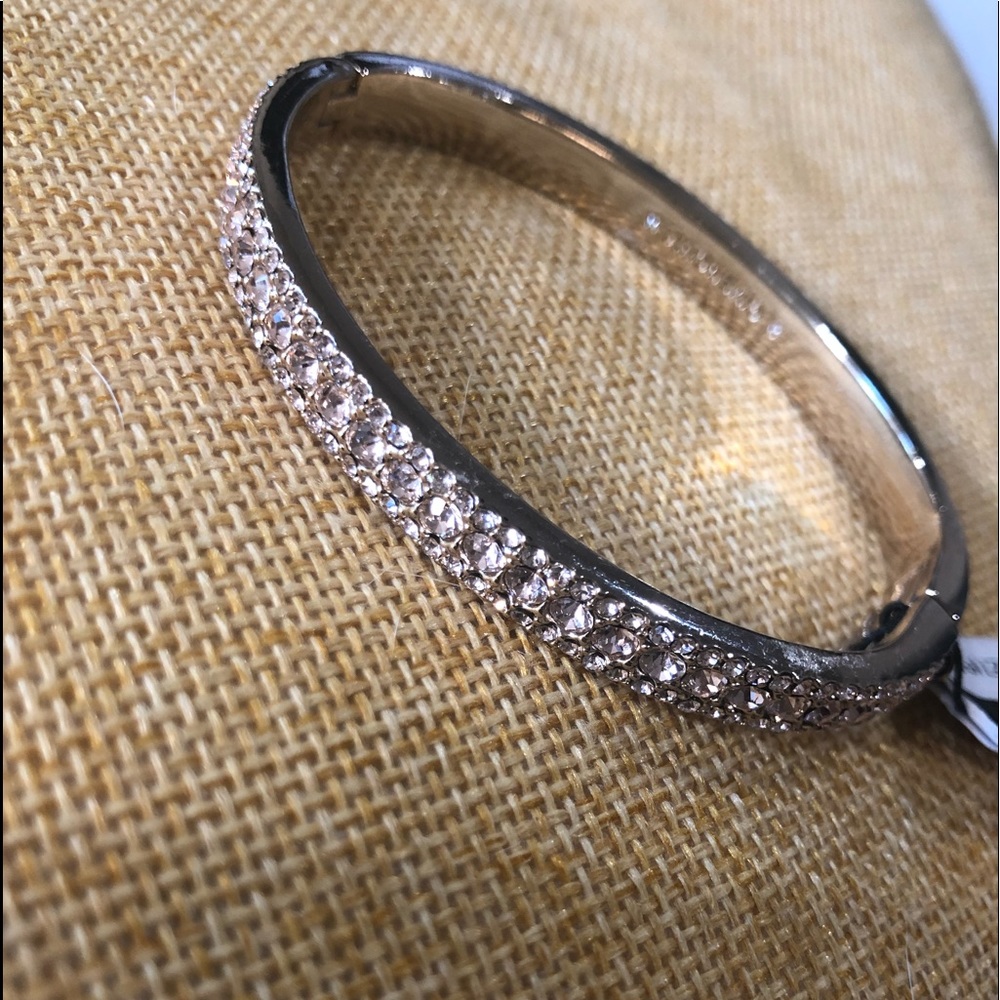 Givenchy gold tone 3 row crystal hinged bracelet